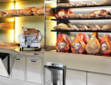 Bread wall display with refrigerated storage